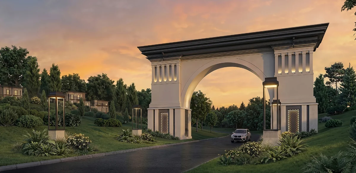 Gerbang kawasan neo-klasik Summarecon Bogor dengan arch megah saat senja